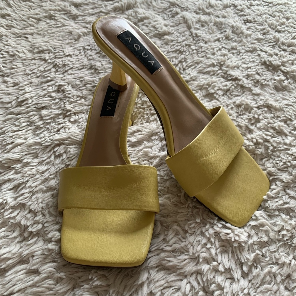 Yellow kitten heel slides